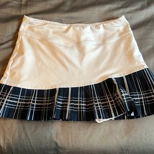 Inphorm size small whit wand navy plaid tennis skirt